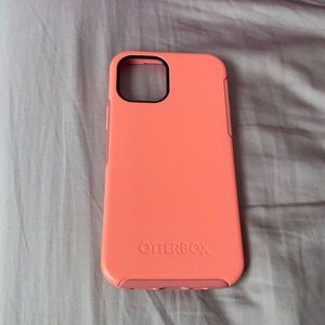 Otterbox phone case in the color pink.